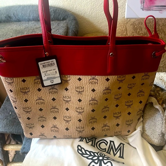 MCM Handbags - MCM Tote Bag brand new with tags. Very good size for your everyday needs